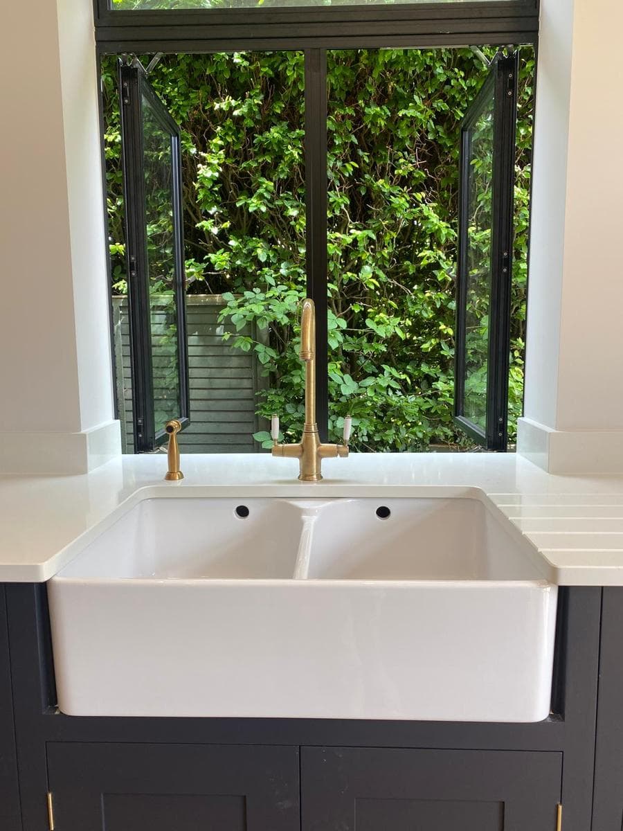 Sink under the steel framed window
