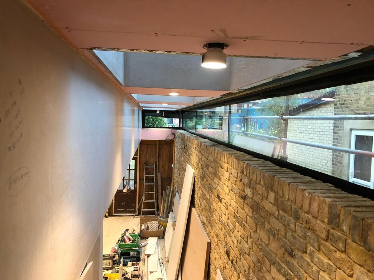 Clerestory glazing above the brick