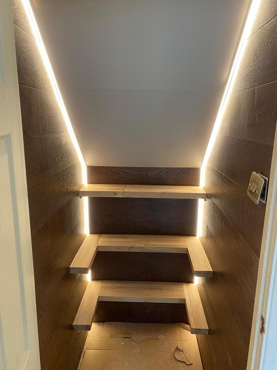 Staircase with LED strip, dark treads