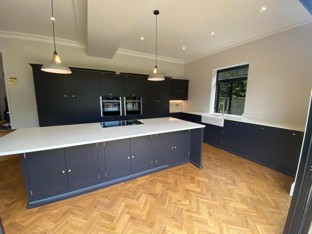 Navy kitchen, ovens and island