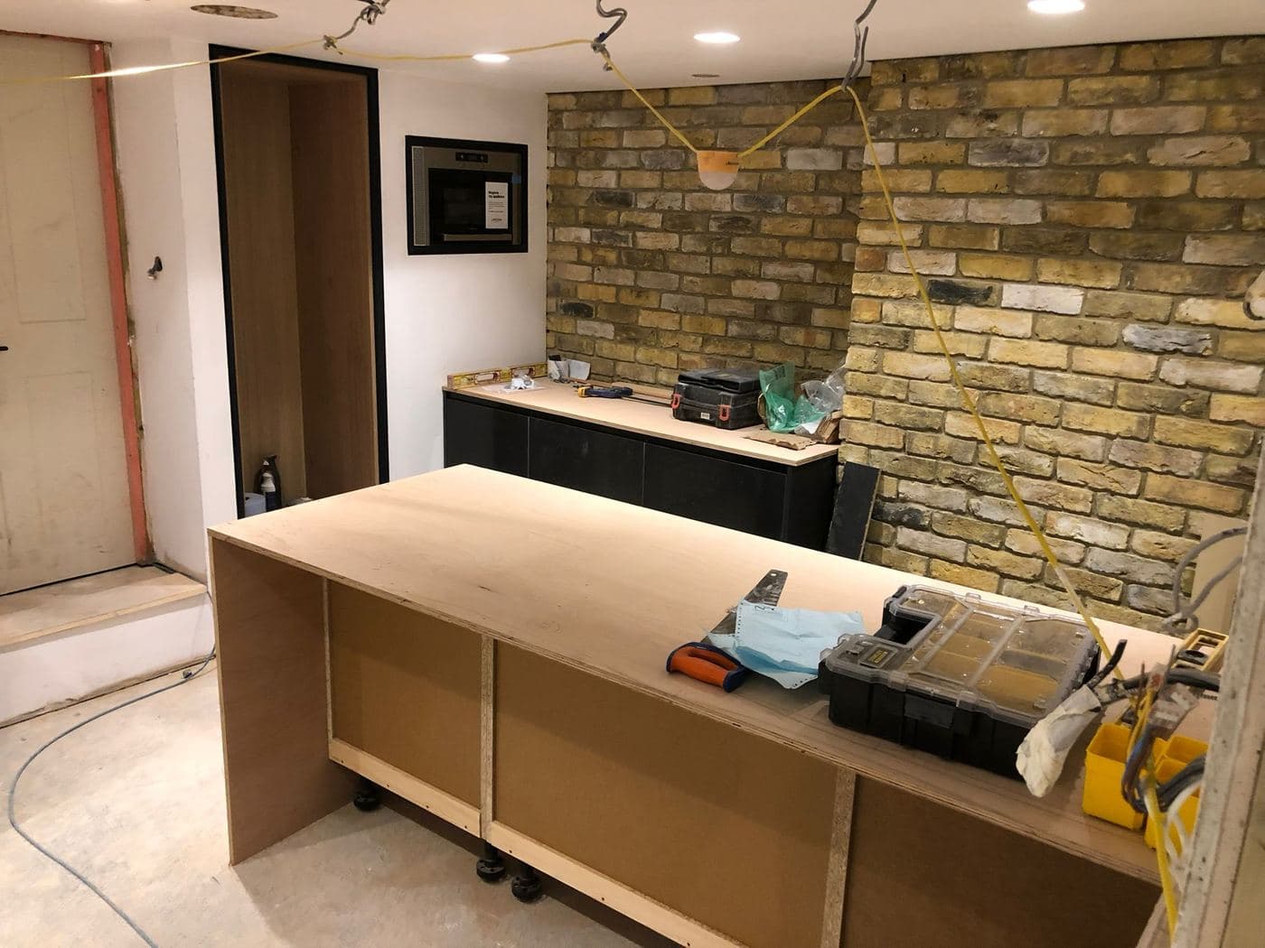 Kitchen island carcass being built on site