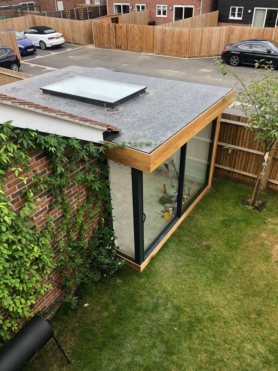 Garden room interior with a rooflight and glazed doors