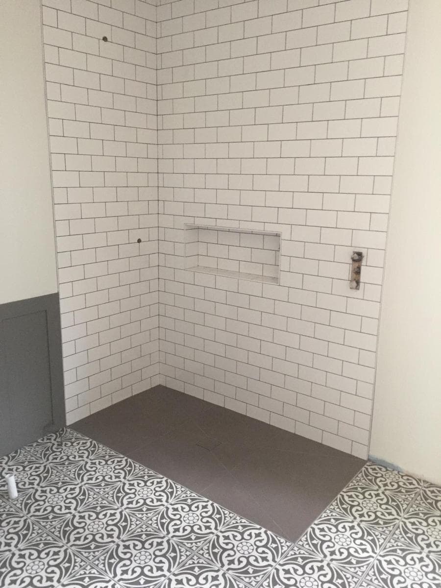 Bathroom, patterned floor tiles