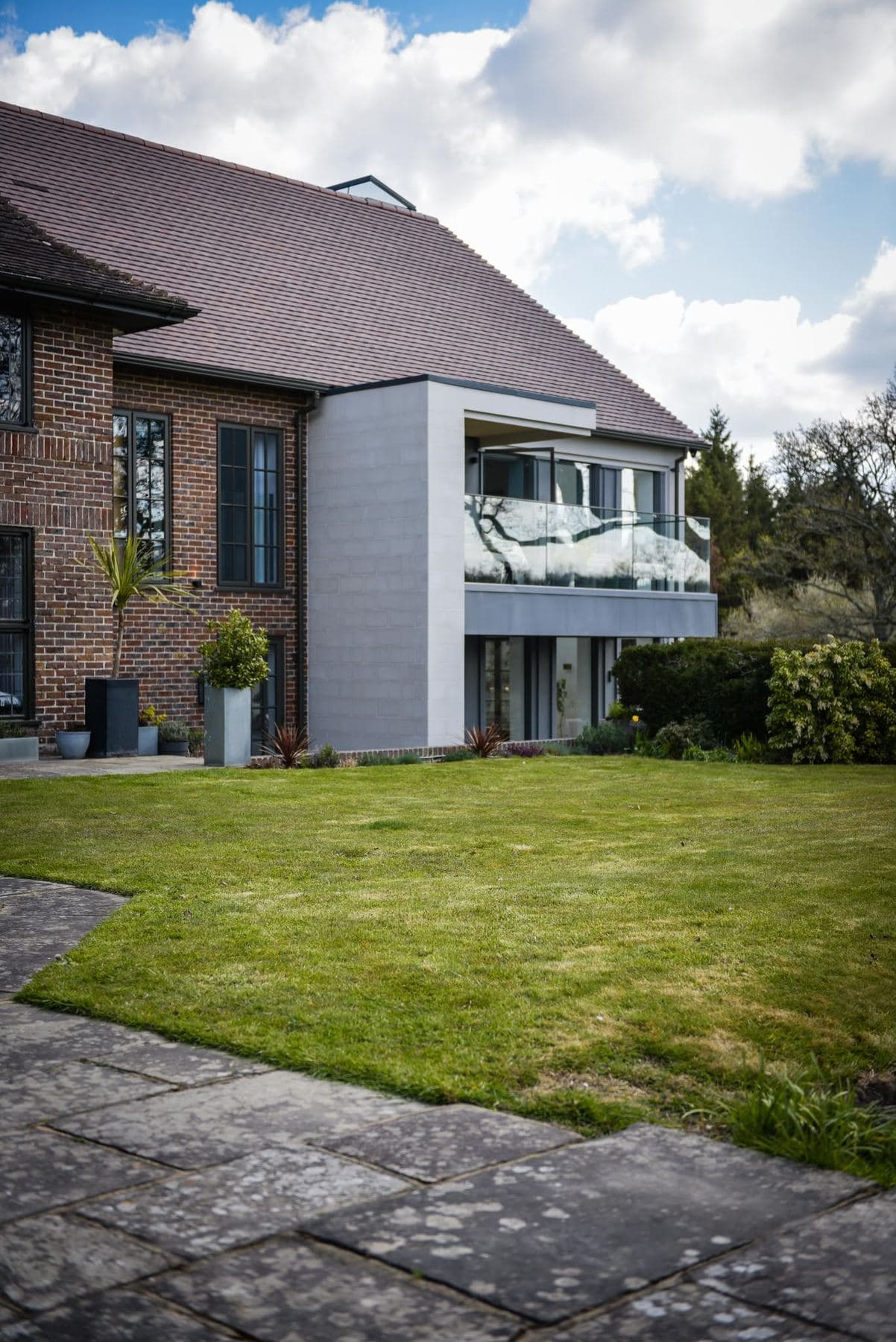 Front elevation of Parrock Place after the extension and refurbishment, red brick with hipped roof