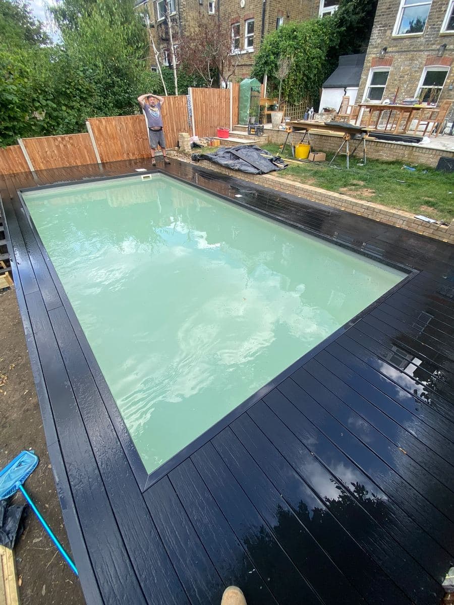Composite decking surrounding an outdoor pool