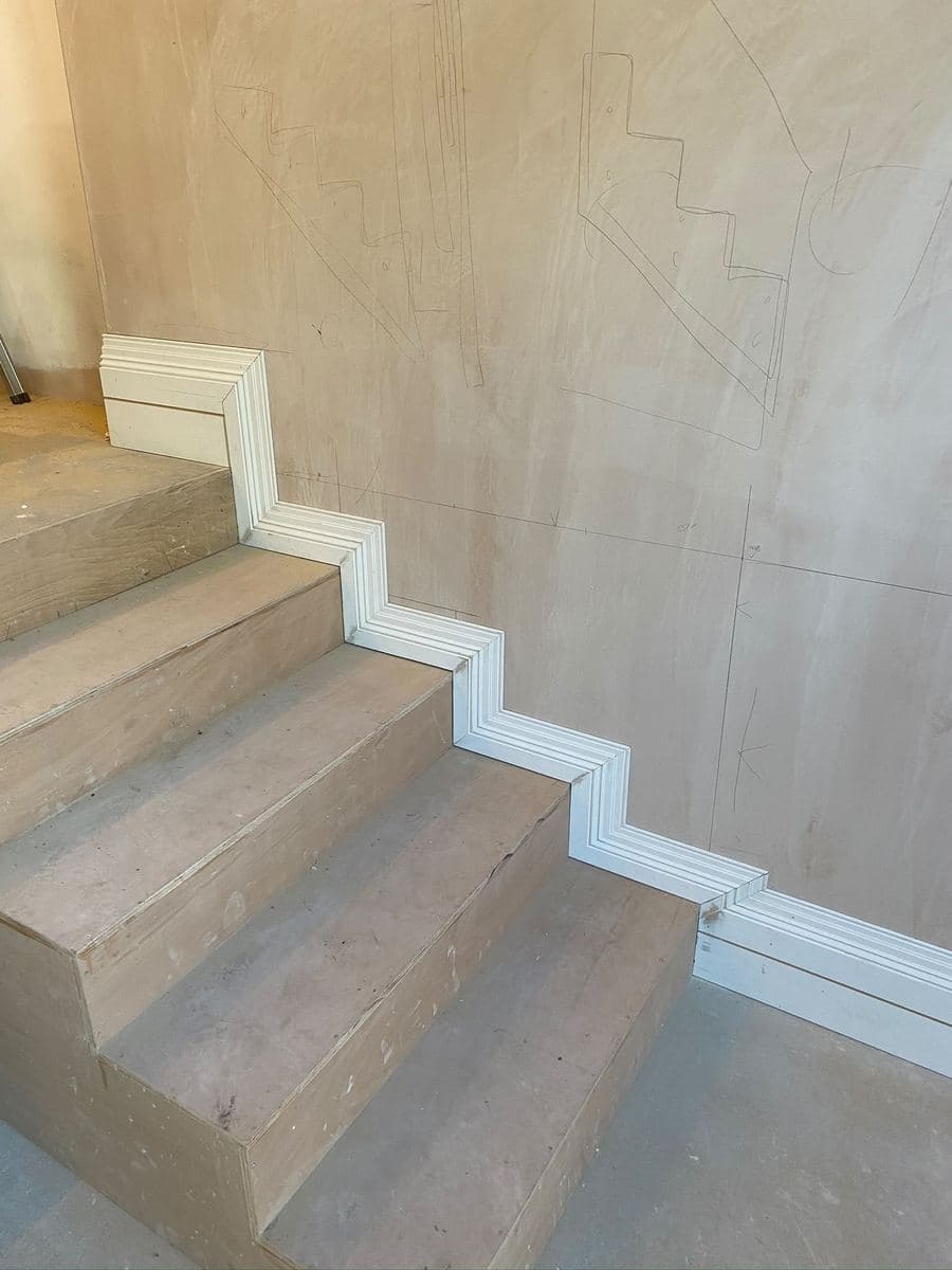 Staircase lined and plastered, ready for the final coat