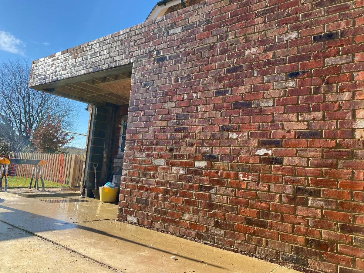 Opening formed in the brickwork below the veranda