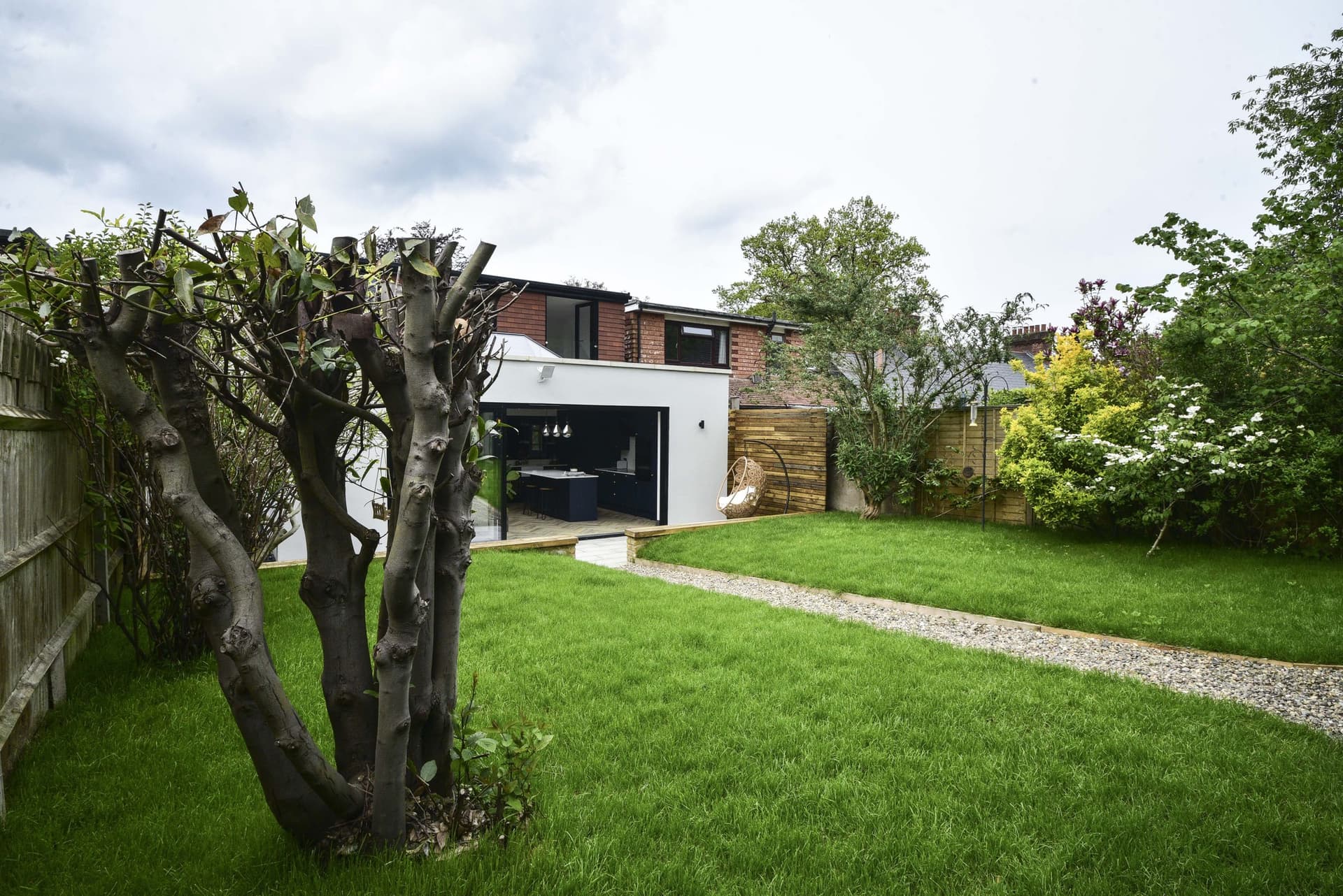 Timber frame garden room at the end of a Kent garden